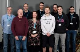 A photo of the IT Support team. Left to right: Simon, Chris G, Karl, Tamsyn, Ally, Seb, Chris J, Jonathan and Jamie.